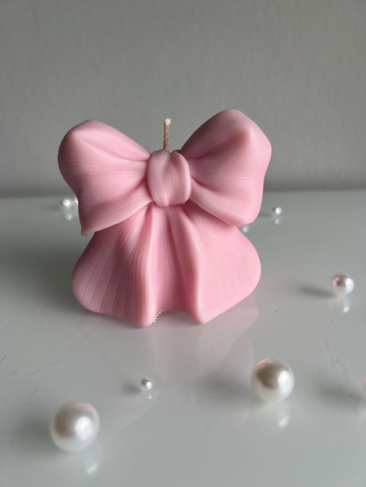 blush pink ribbon bow candle